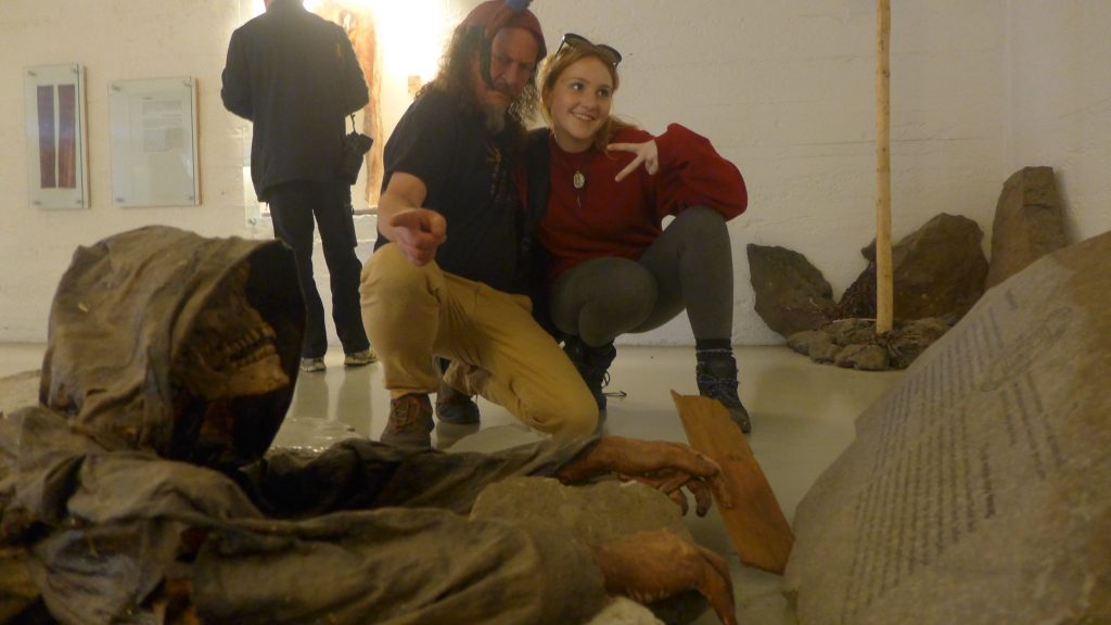 Today’s Viking of the Day (Fiona) is photographed with Sigridson. In the foreground what a bit of a haunting replica of what appeared to be the grim reaper.